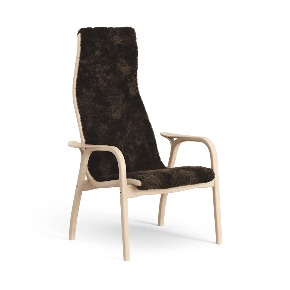 Lamino-Sessel | Swedese | Lundia Living mit hoher Rückenlehne, weichem, dunkelgrünem Bezug und hellem Holzgestell