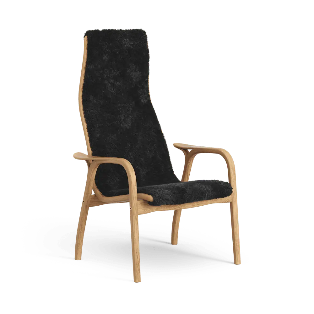 Lamino Sessel | Swedese | Lundia Living: Hochwertiges Design und weicher, schwarzer Bezug auf einem eleganten, formschönen Holzgestell